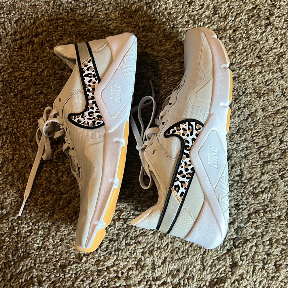 Nike leopard tennis shoes.